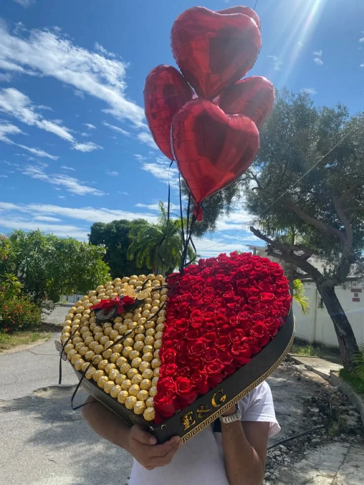 Heart shape luxury chocolate and red rose gift box with Ferrero Rocher and foil balloons