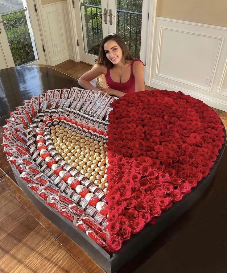 Heart shape luxury gift box with red roses and Ferrero Rocher chocolates for Valentine’s Day