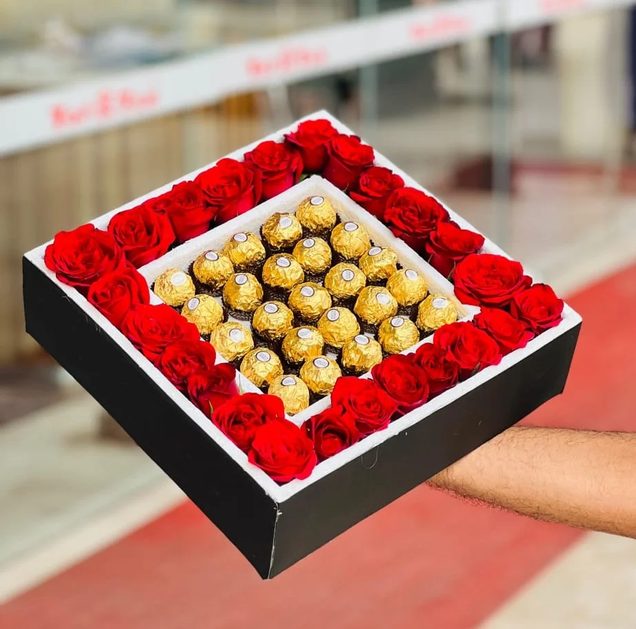 Premium chocolate box with 24 Ferrero Rocher chocolates and red roses