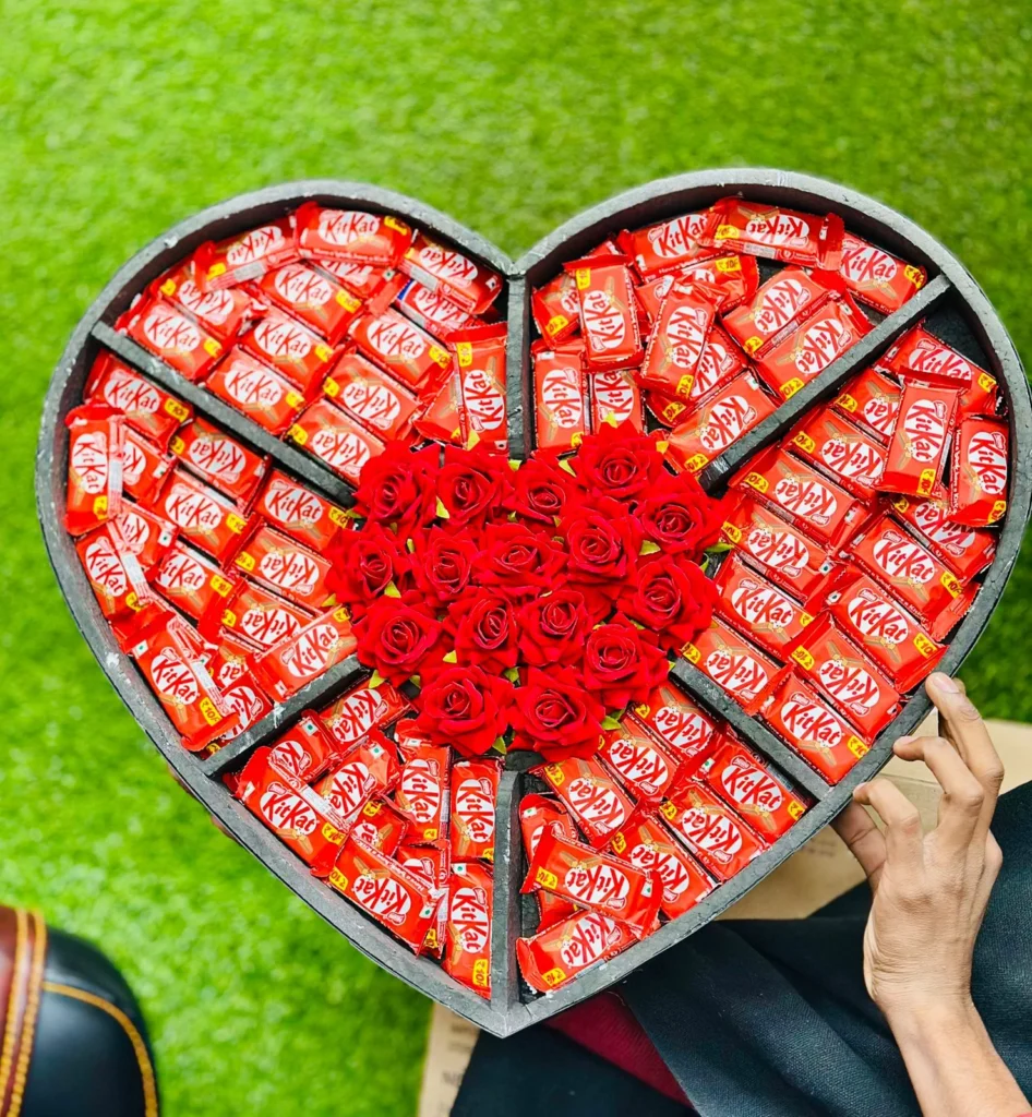 Heart shaped luxury KitKat chocolate box with artifitial red roses by The Gift Heaven Bangladesh