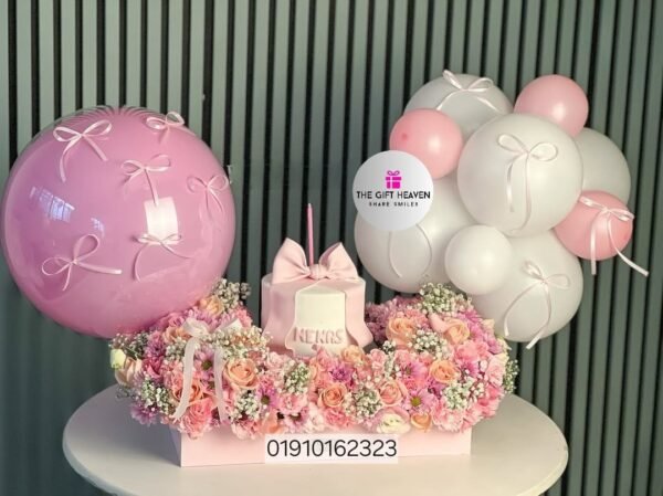 Luxury cake, floral decoration with balloons