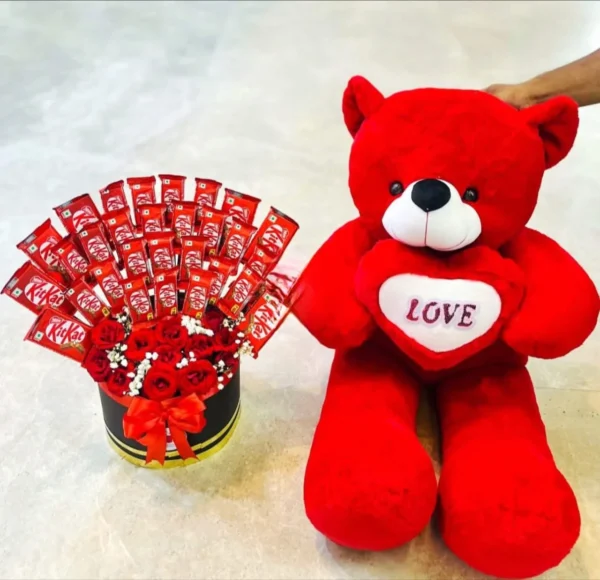 Luxury KitKat chocolate flower box with premium red roses and a giant red teddy bear holding a LOVE heart, perfect for birthdays, anniversaries, Valentine's Day, and romantic surprises in Bangladesh.