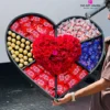 Luxury giant heart-shaped chocolate gift box with fresh red roses, Ferrero Rocher, KitKat, Raffaello, and Cadbury Dairy Milk chocolates, handcrafted by The Gift Heaven for romantic occasions in Bangladesh.