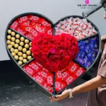 Luxury giant heart-shaped chocolate gift box with fresh red roses, Ferrero Rocher, KitKat, Raffaello, and Cadbury Dairy Milk chocolates, handcrafted by The Gift Heaven for romantic occasions in Bangladesh.