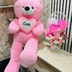 Luxury pink apology gift combo featuring a giant teddy bear, hot air balloon chocolate flower box, mini teddy, premium chocolates, and elegant pink floral arrangement, perfect for saying sorry in Bangladesh.