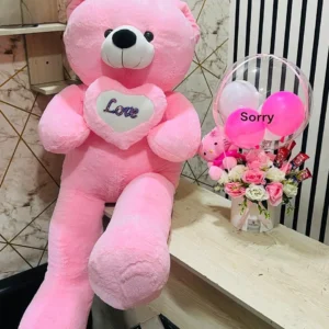 Luxury pink apology gift combo featuring a giant teddy bear, hot air balloon chocolate flower box, mini teddy, premium chocolates, and elegant pink floral arrangement, perfect for saying sorry in Bangladesh.