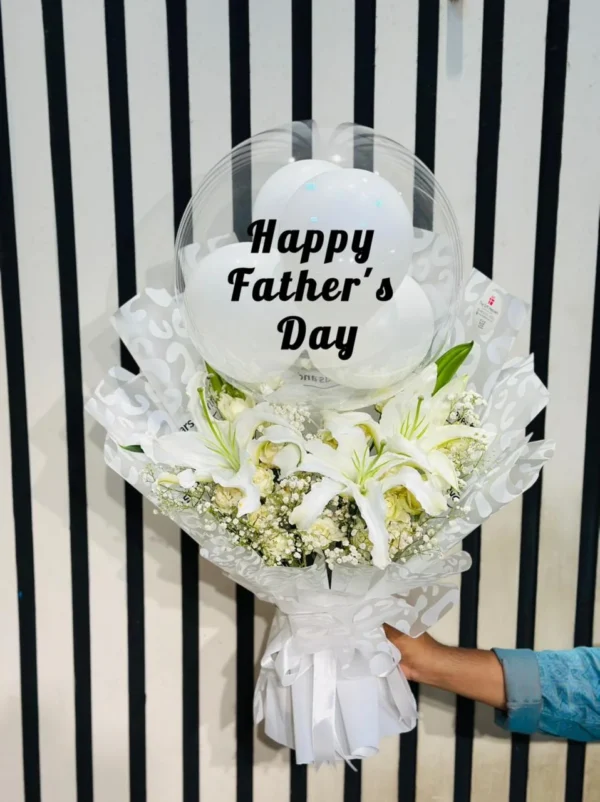 Luxury Happy Father's Day white lily bouquet with balloon and elegant white floral wrapping by The Gift Heaven Bangladesh