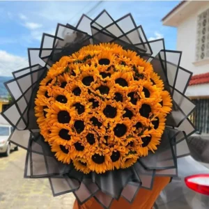 Luxury sunflower bouquet with premium fresh sunflowers wrapped in elegant black luxury paper, perfect for birthdays, anniversaries, congratulations, and special occasions in Bangladesh.