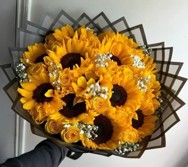 Luxury sunflower and yellow rose bouquet with premium fresh sunflowers, yellow roses, and baby's breath, elegantly wrapped in black luxury paper for birthdays, anniversaries, and special occasions in Bangladesh.